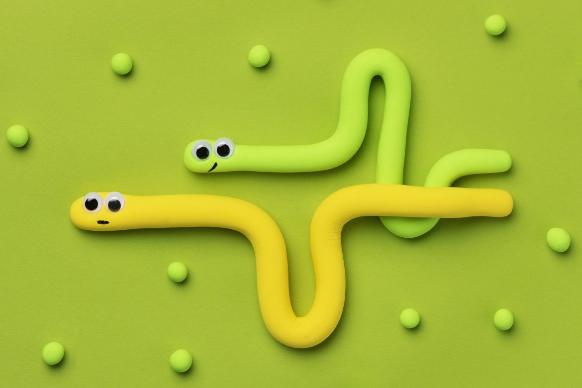 cute-play-dough-snakes-with-green-background Snake Game Development